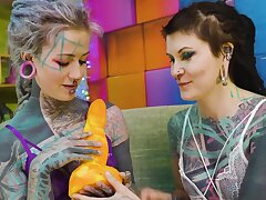 Two tattooed girls get exasperation fucked by a big dick